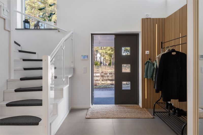 Nyläggning av klinker i hall i villa Solna Hagalund